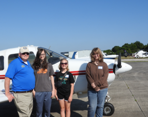EAA Chapter 534 pilot Lee Helfer, and Young Eagle crew Corbin Sloboda, Hayley Hawthorn, and Sophie Ellingson.