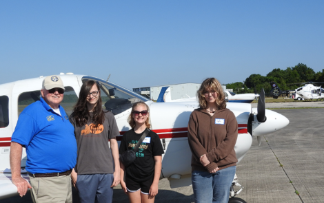 EAA Chapter 534 pilot Lee Helfer, and Young Eagle crew Corbin Sloboda, Hayley Hawthorn, and Sophie Ellingson.