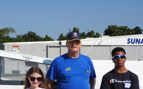 Young Eagle Gracie Abbott, EAA Chapter 534 pilot Marc Morel, and Young Eagle Jaden Crockwell.
