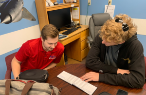 Brody Seth (black hoodie) with CFI and previous Ray Scholar Connor Davis (red shirt)