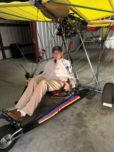 George Karamitis sitting on plane